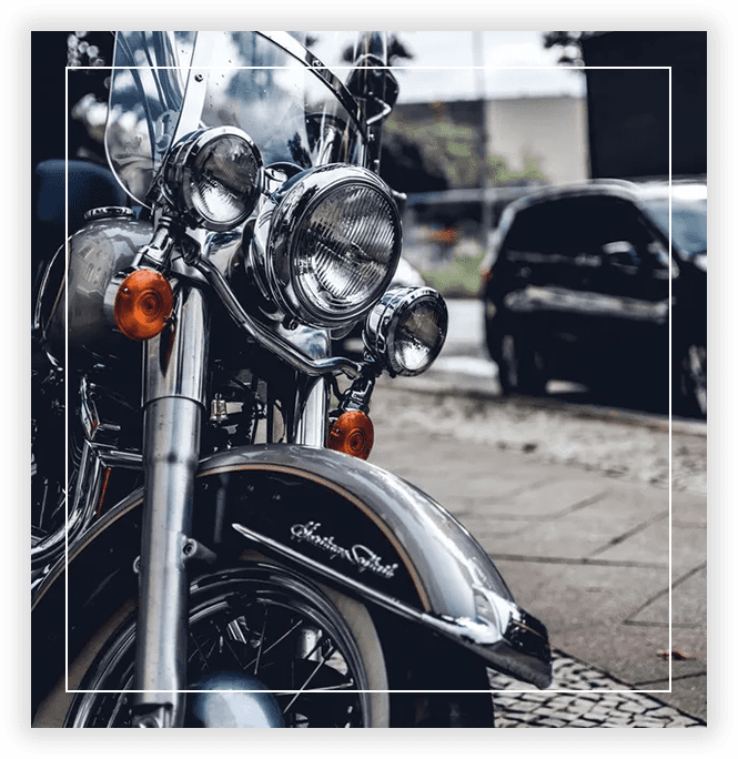 A close up of the front end of a motorcycle.